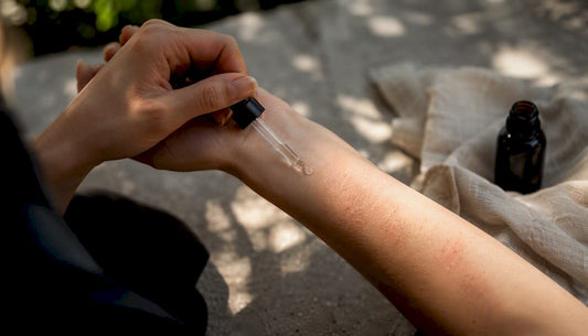 Applying essential oil on irritated skin