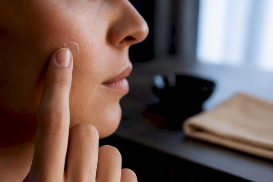 Fingertip touching sensitised cheek
